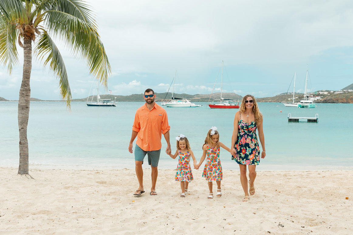 family walking on beach in st thomas