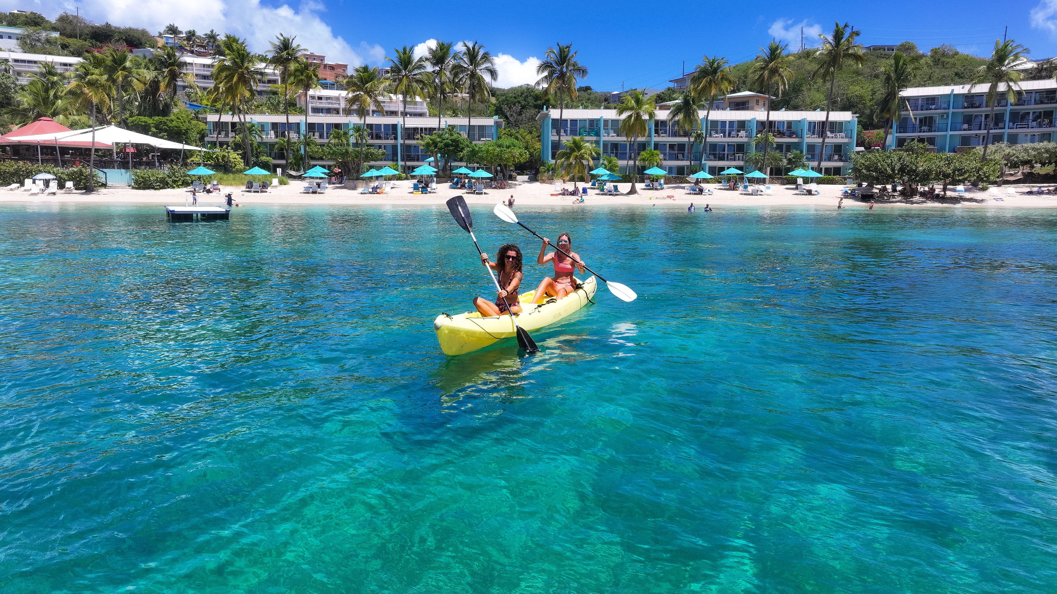 two women in a kayak on the water